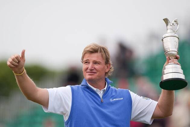 Golf - The Open - Day Four Ernie Els of South Africa poses with the trophy at Royal Lytham & St Anne s Golf Club 