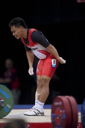 July 31, 2012 - London, England, United Kingdom - EKO YULI IRAWAN (INA) celebrates completing a lift in the men s 62kg weightlifting competition at ExCeL in London. EKO won an Olympic Bronzemedal. Olympics 2012 - Weightlifting - ZUMAw10