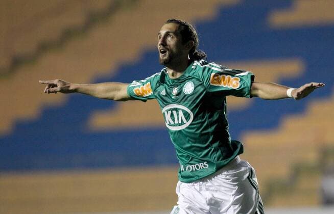 Aug. 1, 2012 - Barueri, Brazil - BARCOS, of Brazil s Palmeiras, celebrates after scoring against Brazil s Botafogo, during a Copa Sudamericana match at Barueri Arena, in southeastern Brazil. Palmeiras won 2-0. Soccer 2012 - Palmeiras Beats Botafogo 2-0  - ZUMAe83