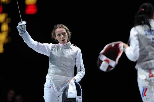 ITAR-TASS: LONDON, UNITED KINGDOM. AUGUST 1, 2012. Italy s Valentina Vezzali celebrates her team s victory over the Russian team in the women s team foil gold medal bout during the 2012 London Summer Olympic Games.  RE104BBC