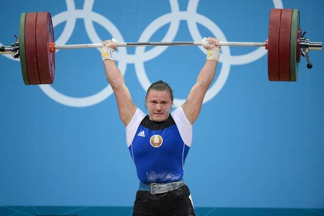 Aug. 3, 2012 - London, GBR - Iryna Kulesha of Belarus competes in the women s 75kg weightlifting competition the ExCeL centre during the 2012 Summer Olympic Games in London, England, Friday, August 3, 2012. Kulesha won the bronze medal in the event. 2012 Summer Olympics Weightlifting - ZUMAm67