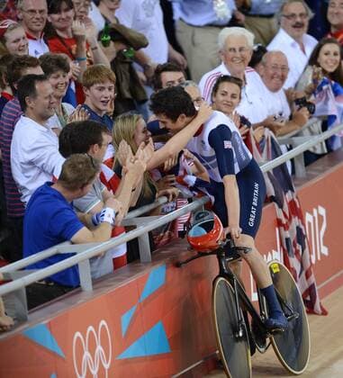 LONDON, Aug. 3, 2012 - Geraint Thomas of Britain is congratulated after the men s team pursuit of Cycling track event at London 2012 Olympic Games, London, Britain, Aug. 3, 2012. (OLY2012)BRITAIN-LONDON-CYCLING TRACT-MEN-TEAM PURSUIT 
