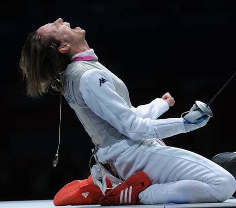 LONDON, AUGUST 3, 2012. Italy s Valentina Vezzali celebrates her team s victory over the Russian team in the women s team foil gold medal bout during the 2012 London Summer Olympic Games.  Aufmacher RE104B9E