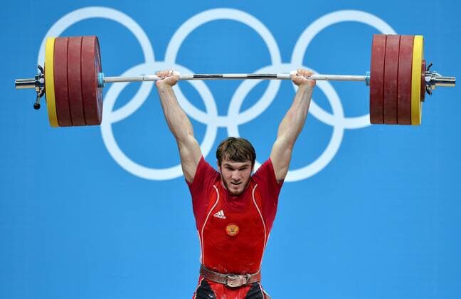 LONDON, Aug. 3, 2012 - Apti Aukhadov of Russia competes during men s 85kg weightlifting event at London 2012 Olympic Games, London, Britain, Aug. 3, 2012. Apti Aukhadov of Russia claimed the silver medal of the event. (Xinhua Gong Lei) (OLY2012)BRITAIN-LONDON-WEIGHTLIFTING-MEN-85KG 