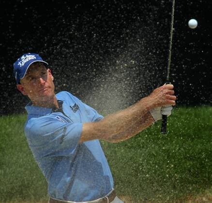 Aug. 3, 2012 - Akron, OH, USA - Jim Furyk hits his third shot from a bunker on the 18th hole during second-round play at the 2012 WGC-Bridgestone Invitational at Firestone Country Club on Friday, August 3, 2012, in Akron, Ohio. 2012 WGC-Bridgestone Invitational - ZUMAm67