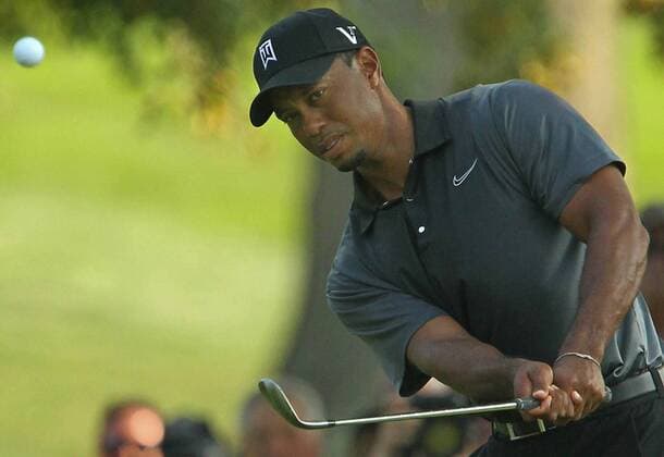 Aug. 3, 2012 - Akron, OH, USA - Tiger Woods hits a chip shot to the 10th green during second-round play at the 2012 WGC-Bridgestone Invitational at Firestone Country Club on Friday, August 3, 2012, in Akron, Ohio. 2012 WGC-Bridgestone Invitational - ZUMAm67