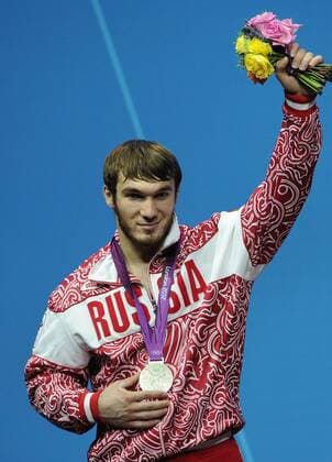 LONDON, GREAT BRITAIN. AUGUST 3, 2012. Russia s Apti Aukhadov has won silver in the Men s 85kg Weightlifting at the London 2012 Olympic Games.  RE104D1F