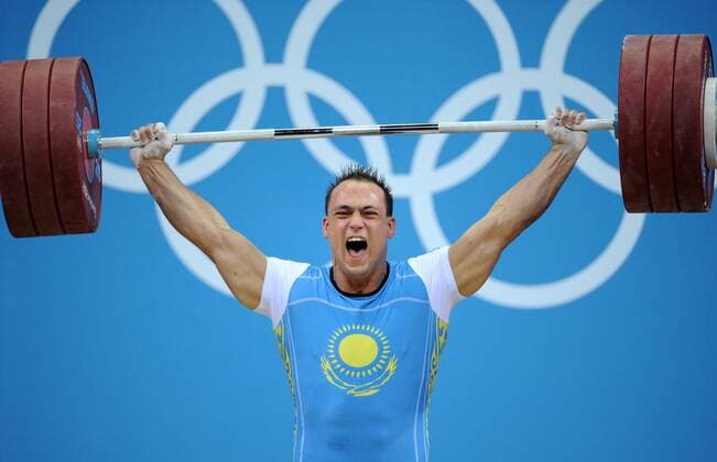 LONDON, GREAT BRITAIN. AUGUST 4, 2012. Ilya Ilyin of Kazakhstan competes to win gold in the Men s 94kg Weightlifting at the London 2012 Olympic Games.  RE104EAA