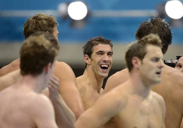 Michael Phelps of the USA smiles after winning a Gold Medal in the Men s 4x100m Medley Relay Final at the London 2012 Summer Olympics on August 4, 2012 in Stratford, London. The United States finished with a time of 3:29.35 in the final to take the Gold.  OLY20120804447
