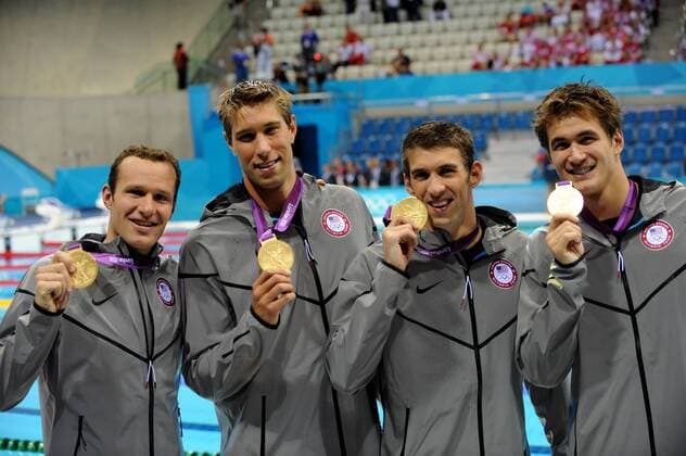 The USA team of Matt Grevers, Brendan Hansen, Michael Phelps and Nathan Adrian show their gold medals for the Men s 4x100 Medley Relay Final at the Aquatics Center during the London 2012 Summer Olympics in Stratford, London on August 4, 2012. Phelps won his record 18th gold and 22nd Olympic Medals to end his Olympic career.  OLY20120804122