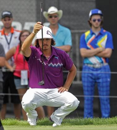 Aug. 4, 2012 - Akron, OH, USA - Rickie Fowler lines up a putt on the 18th hole during the third round of the Bridgestone Invitational at Firestone Country Club on Saturday, August 4, 2012, in Akron, Ohio. Bridgestone Invitational - ZUMAm67