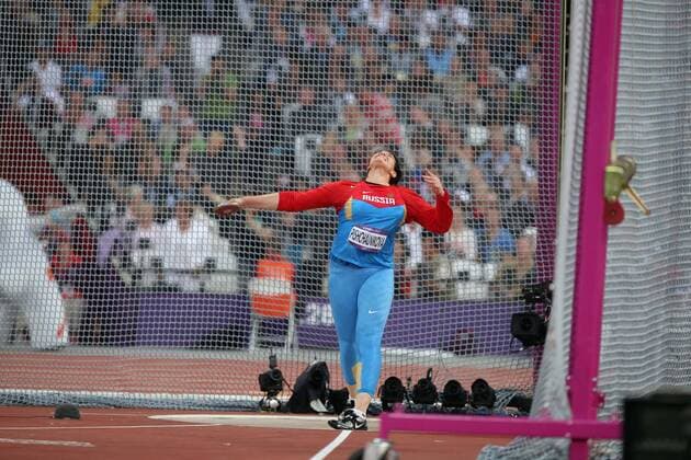 Darya Pishchalnikova of Russia competes during women s discus throw final competition, at London 2012 Olympic Games in London, Britain, on August 4, 2012. Darya Pishchalnikova of Russia won silvermedal. (Xinhua Wang Lili) (nxl) (OLY2012)BRITAIN-LONDON-ATHLETICS-WOMEN S DISCUS THROW 