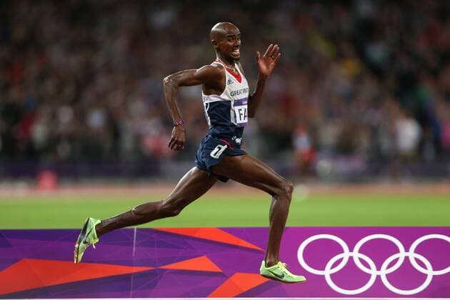 Athletics - London 2012 Olympics - Mens 10000m Mohamed Mo Farah of Great Britain runs down the home straight in the 10000m at the Olympic Stadium, Stratford 