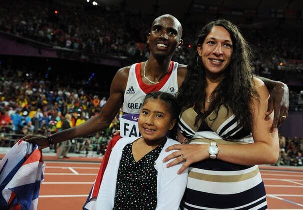 London,Grossbritannien, Olympische Spiele London 2012, Olympiastadion, Olympic Stadium London Leichtathletik, athletics Mohamed Mo Farah mit Tochter Rihanna und Frau Tania Nell