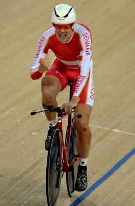 LONDON, Aug. 5, 2012 - Lasse Norman Hansen of Denmark celebrates during the men s omnium match of Cycling Track at London 2012 Olympic Games, London, Britain, Aug. 5, 2012. Lasse Norman Hansen won the gold of the event. 
