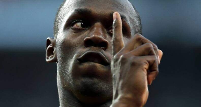 Aug. 5, 2012 - London, England, United Kingdom - Jamaica s USAIN BOLT shows who s number one after winning the men s 100m sprint during the Summer Olympic Games with an Olympic record time of 9.63 seconds. Olympics 2012 - Athletics - Bolt Wins Men s 100m Final - ZUMAm67