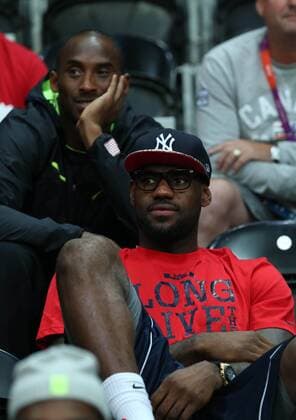 (120807) -- LONDON, Aug. 7, 2012 (Xinhua) -- Lebron James and Kobe Bryant of USA basketball team are picutured during women s basketball quarterfinal match between USA and Canada at London 2012 Olympic Games in London, Britain, on August 7, 2012. USA won 91-48. (Xinhua Meng Yongmin) (nxl) (OLY2012)BRITAIN-LONDON-BASKETBALL-WOMEN 