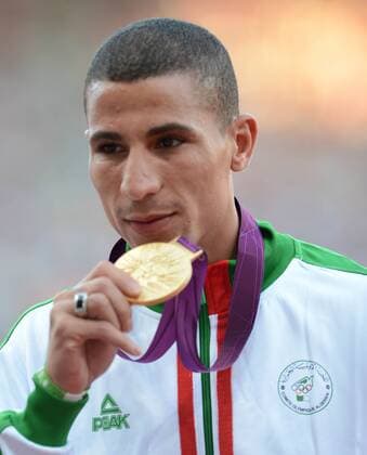 LONDON, Aug. 8, 2012 - Gold medalist Taoufik Makhloufi of Algeria attends victory ceremony of men s 1500m competition, at London 2012 Olympic Games in London, Britain, on August 8, 2012. (OLY2012)BRITAIN-LONDON-ATHLETICS-MEN S 1500M 