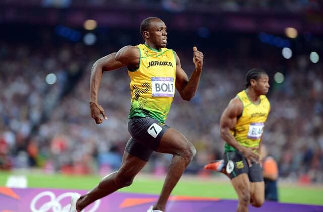 (120809) -- LONDON, Aug. 9, 2012 (Xinhua) -- Usain Bolt (L) of Jamaica competes in men s 200m final, at London 2012 Olympic Games, London, Britain, Aug. 9, 2012. Usain Bolt won goldmedal with 19.32. (Xinhua Yang Zongyou)(zgp) (OLY2012)BRITAIN-LONDON-MEN S 200M-GOLD 