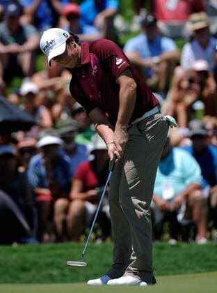 Rory McIlroy of Northern Ireland putts out on hole nine to finish the day at 5-under-par during the first round of the PGA Golf Herren Championship on August 9, 2012 at the Ocean Course in Kiawah Island, South, Carolina.  SCP20120809124