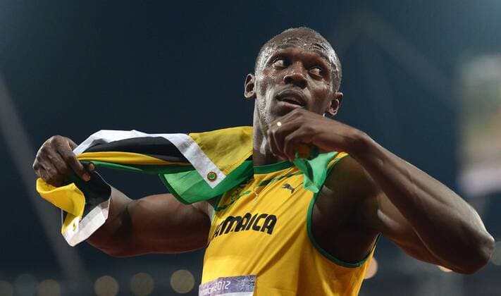 (120809) -- LONDON, Aug. 9, 2012 (Xinhua) -- Usain Bolt of Jamaica celebrates after men s 200m final, at London 2012 Olympic Games, London, Britain, Aug. 9, 2012. Usain Bolt won goldmedal with 19.32. (Xinhua Li Ga)(zgp) (OLY2012)BRITAIN-LONDON-MEN S 200M 