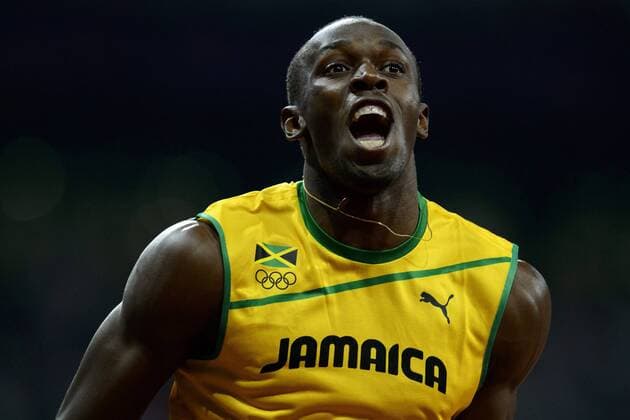 09.08.2012 London, England. Jamaicas Usain Bolt (JAM) wins Gold in the Men s 200m Final ahead of compatriots Johan Blake (JAM) in second (Silver) and Warren Weir (JAM) in third (Bronze) during the Athletics on Day 13 of the London 2012 Olympic Games in the Olympic Stadium. xRoganxThomsonx  ActionPlus20138953
