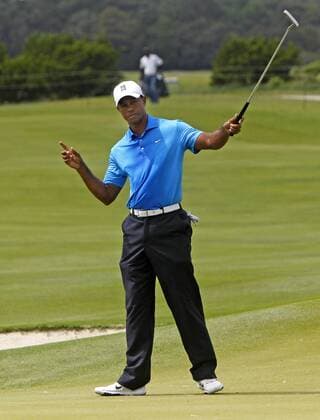 Aug. 10, 2012 - Kiawah Island, SC, USA - Tiger Woods reacts after making a putt for birdie on the 4th hole during the second round of the 2012 PGA Golf Herren Championship at the Ocean Course on Kiawah Island, South Carolina, on Friday, August 10, 2012. PGA Golf Herren Championship - ZUMAm67