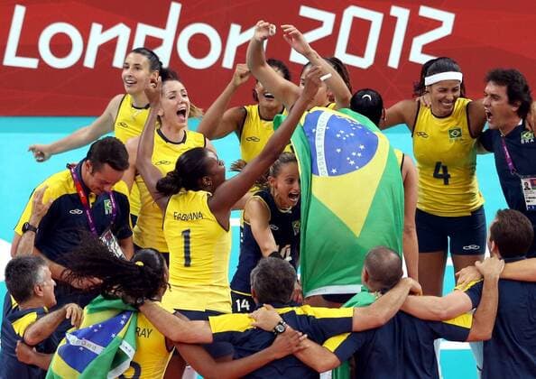 Brazilian players celebrate after women s volleyball gold medal match between Brazil and USA, at London 2012 Olympic Games in London, Britain, on August 11, 2012. (Xinhua Fan Jun) (nxl) (OLY2012)BRITAIN-LONDON-VOLLEYBALL-WOMEN 