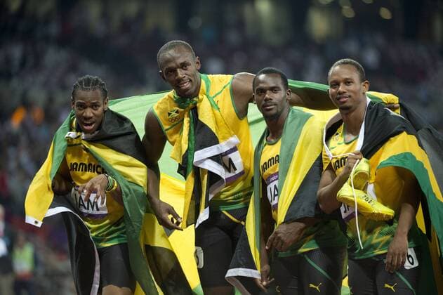 Aug. 11, 2012 - London, England, United Kingdom - Usain Bolt (JAM), second from left, celebrate winning the Gold in the Men s 4 x 100m Relay in during the London Olympics 2012 at the Olympic Stadium on August 11, 2012 in London, United Kingdom. Olympics 2012 - - ZUMAj89