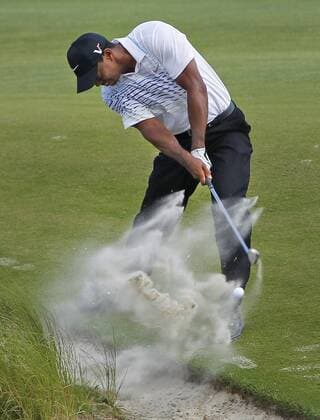 Aug. 11, 2012 - Kiawah Island, SC, USA - Tiger Woods blasts out of the sand on the 7th hole during the third round of the 2012 PGA Golf Herren Championship at the Ocean Course on Kiawah Island, South Carolina, on Saturday, August 11, 2012. PGA Golf Herren Championship, 3rd round - ZUMAm67