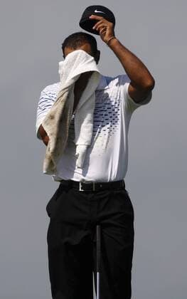 Aug. 11, 2012 - Kiawah Island, SC, USA - Tiger Woods wipes sweat off his face on the 3rd hole during the third round of the 2012 PGA Golf Herren Championship at the Ocean Course on Kiawah Island, South Carolina, on Saturday, August 11, 2012. PGA Golf Herren Championship, 3rd round - ZUMAm67