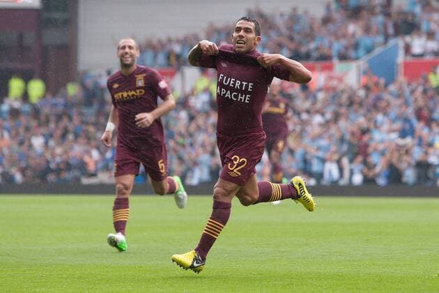 Football - FA Community Shield - Chelsea FC London vs. Manchester City; Carlos Tevez of Manchester City celebrates scoring, putting his side 1:2 up at Villa Park 