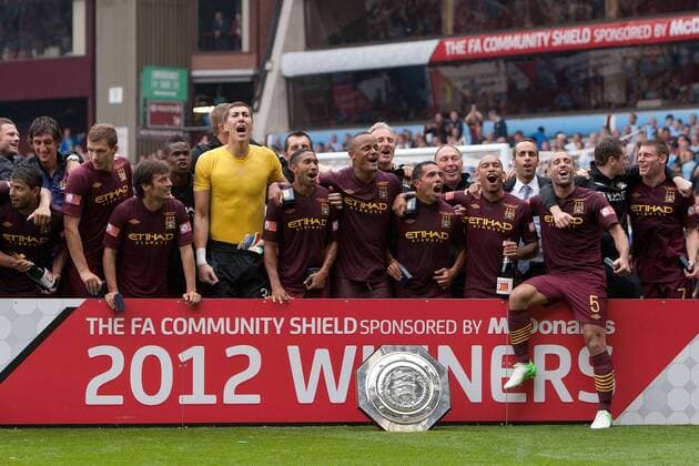 Football - FA Community Shield - Chelsea FC London vs. Manchester City; Manchester City celebrate victory with the shield at Villa Park 