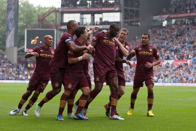 Football - FA Community Shield - Chelsea FC London vs. Manchester City; Yaya Toure of Manchester City celebrates his equalising goal at Villa Park 