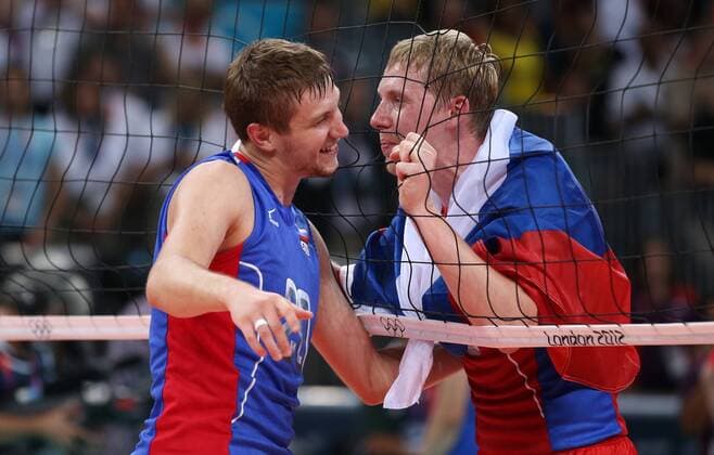 LONDON, Aug. 12, 2012 - Alexey Obmochaev (L) - Russian players celebrate after men s volleyball match between Russia and Brazil, at London 2012 Olympic Games in London, Britain, on August 12, 2012. Russia won 3-2. (Xinhua Wang Lili) (nxl) (OLY2012)BRITAIN-LONDON-VOLLEYBALL-MEN 