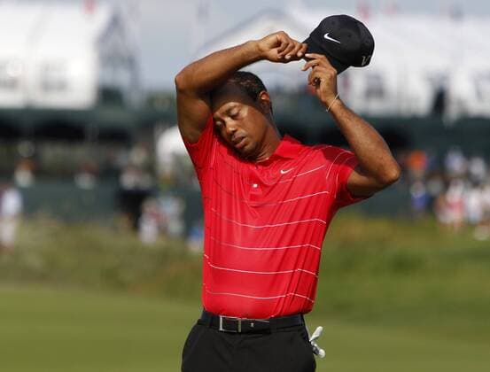 Aug. 12, 2012 - Kiawah Island, SC, USA - Tiger Woods wipes off some sweat after finishing the conclusion of the third round of the PGA Golf Herren Championship on Kiawah Island, South Carolina, Sunday, August 12, 2012. PGA Golf Herren Championship - ZUMAm67