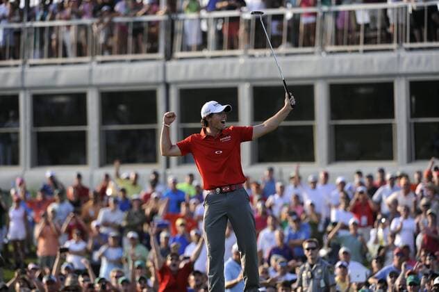 Rory McIlroy of Northern Ireland celebrates a birdie putt on hole 18 for his 8-stroke victory in the final round of the PGA Golf Herren Championship on August 12, 2012 at the Ocean Course in Kiawah Island, South, Carolina.  SCP20120812125