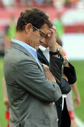 ITAR-TASS: MOSCOW, RUSSIA. AUGUST 15, 2012. Russia s head coach Fabio Capello reacts during an international football friendly between Russia and Cote d Ivoire at Lokomotiv Stadium. The game ended in a 1-1 draw.  premiumd 20140116