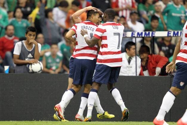 15 August 2012: Michael Orozco Fiscal (USA) (4) celebrates his goal with Maurice Edu (USA) (7) and Herculez Gomez (USA) (behind). The United States Men s National Team defeated the Mexico Men s National Team 1-0 at Estadio Azteca in Mexico City, Mexico in an international friendly soccer match. SOCCER: AUG 15 Mexico v USA Icon918120815018 EDITORIAL USE ONLY