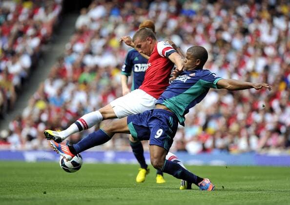 Football Premier League Arsenal Vs Sunderland Lukas Podolski and Fraizer Campbell 