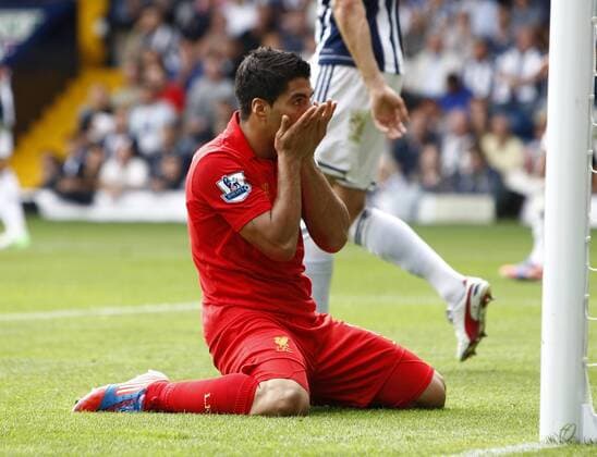 Football- Premier League - West Bromwich Albion vs. Liverpool- Liverpool s Luis Suarez shows his feelings after missing another chance at The Hawthorns 