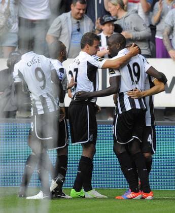 Newcastle United s Demba Ba (R) celebrates scoring his side s first goal..Barclays Premier League match between Newcastle United v Tottenham Hotspur at the Sports Direct Arena, Newcastle upon Tyne on the 18th August 2012. Pic Richard Lee SPORTIMAGE... EDITORIAL USE ONLY. No use with unauthorised audio, video, data, fixture lists, club league logos or live services. Online in-match use limited to 120 images, no video emulation. No use in betting, games or single club league player publications.