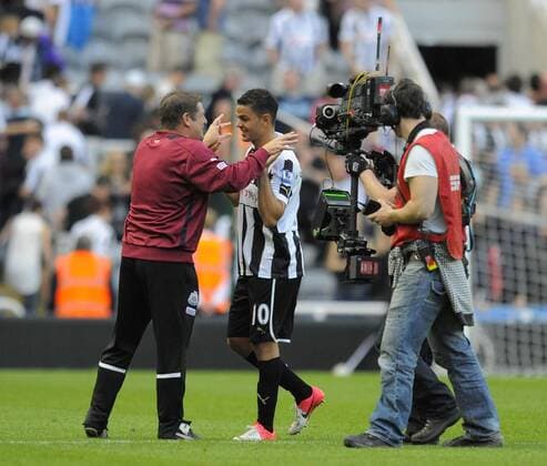 Newcastle United s Hatem Ben Arfa (C) is congratulated by assistant coach John Carver for his winning penalty kick..Barclays Premier League match between Newcastle United v Tottenham Hotspur at the Sports Direct Arena, Newcastle upon Tyne on the 18th August 2012. EDITORIAL USE ONLY. No use with unauthorised audio, video, data, fixture lists, club league logos or live services. Online in-match use limited to 120 images, no video emulation. No use in betting, games or single club league player publications.