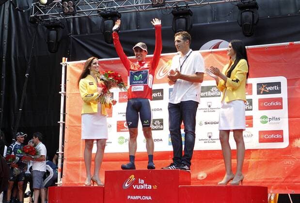 Miguel Indurain gives the Red Malliot of La Vuelta Leader to Mivistar s Jonathan Castroviejo after Special Crono Stage.August 18,2012.  (20260998)