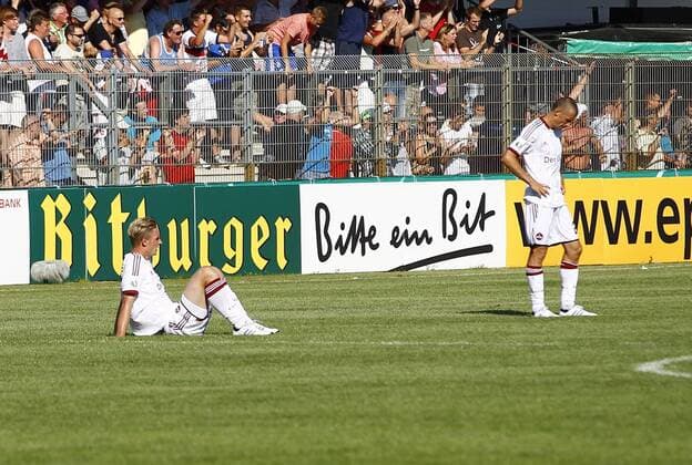 19.08.2012, Wilhelm-Langrehr-Stadion, Garbsen, GER, DFB Pokal 1. Hauptrunde, TSV Havelse vs 1. FC Nürnberg, im Bild Sebastian Polter (8, 1. FC Nürnberg) und Timmy Simons (2, 1. FC Nürnberg) sind völlig enttäuscht GER, DFB Pokal, TSV Havelse vs 1. FC Nürnberg