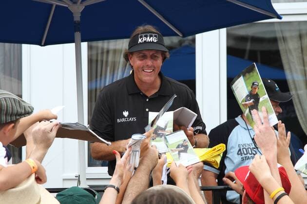 Aug. 22, 2012 - Bethpage, NY, U.S - PGA Golf Herren pro Phil Mickelson signs autographs for fans during the 2012 Pro-Am tournament at Bethpage State Park in Bethpage, NY on Wednesday, August 22nd. PGA Golf Herren 2012 - The Barclays Pro-Am - ZUMAc11