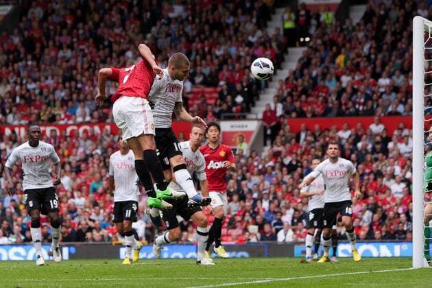 Football - Premier League - Manchester United vs. FC Fulham Rafael of Manchester United scores to put his side 3-1 up at Old Trafford 