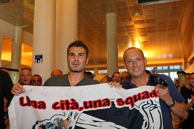 Adrian Mutu - Alain Orsoni ( President Ajaccio ) FOOTBALL : Adrian Mutu - Arrivee Ajaccio - 27 08 2012 GerardPierlovisi Panoramic 