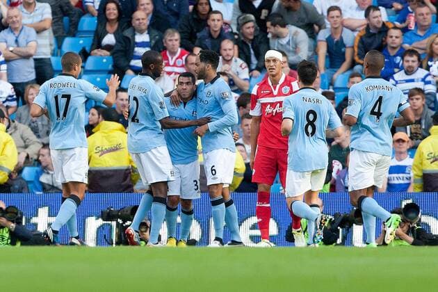 Football - Premier League - Manchester City vs. Queens Park Rangers QPR Yaya Toure of Manchester City celebrates his opening goal at the Etihad Stadium 