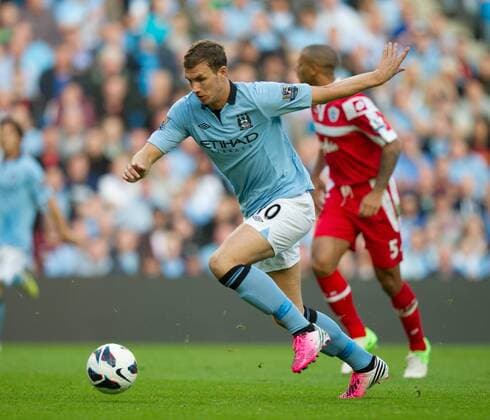Football - Manchester City v Queens Park Rangers QPR - Barclays Premier League - The Etihad Stadium - Season 12 13 - 1 9 12 .Edin Dzeko of Manchester City. EDITORIAL USE ONLY. No use with unauthorised audio, video, data, fixture lists, club league logos or live services. Online in-match use limited to 120 images, no video emulation. No use in betting, games or single club league player publications.